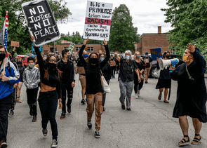 People marching with signs